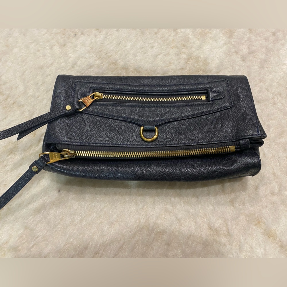 Louis Vuitton Leather Monogram Empriente
Petillante Clutch Infini